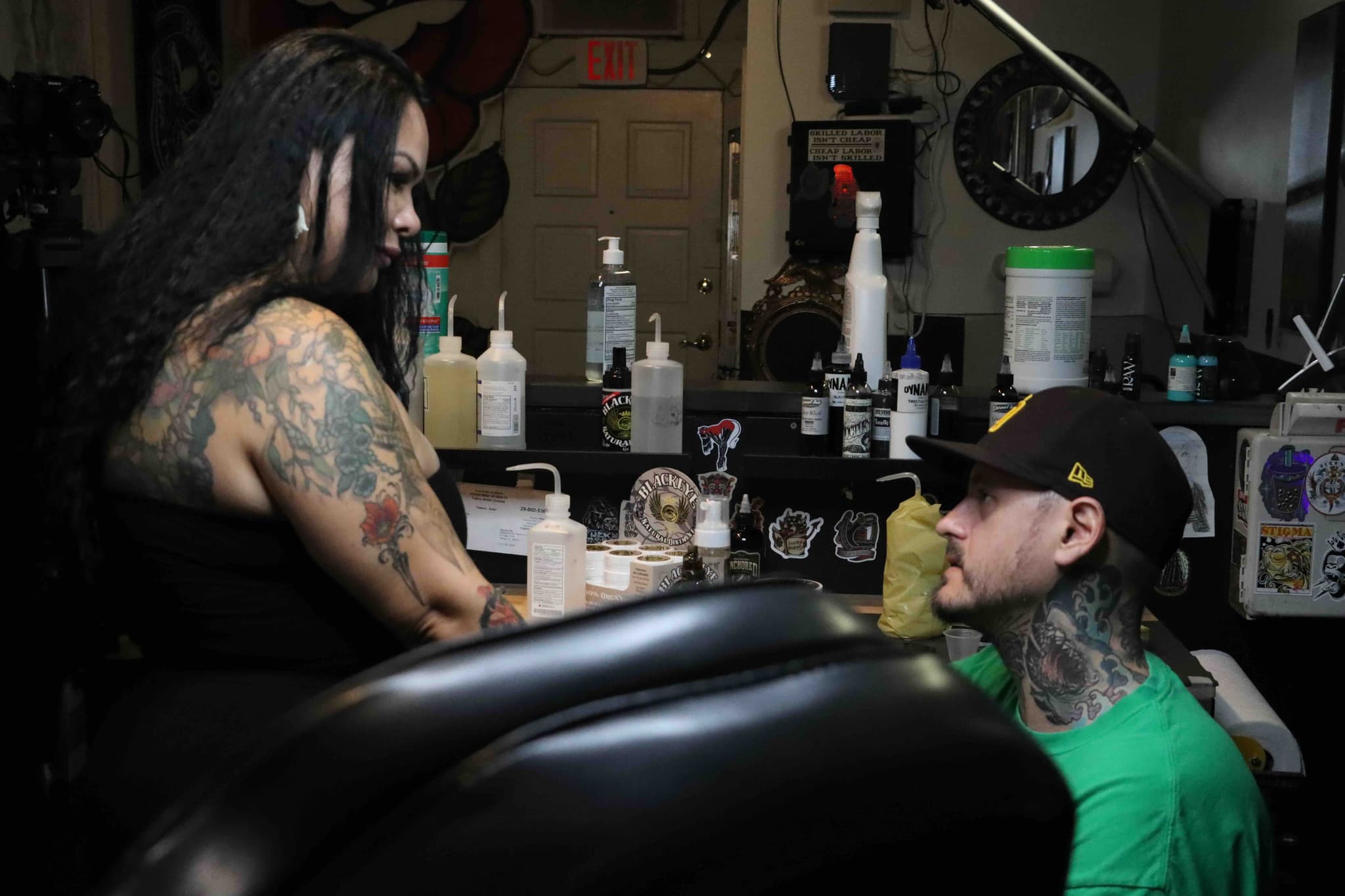 Tampa tattoo artists collaborating in shop